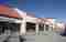 Exterior of ACE Hardware at Merchant's Pointe Shopping Center in Sarasota before painting